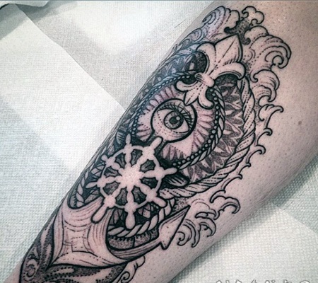 点刺风格的黑色眼睛和船锚小腿纹身图案