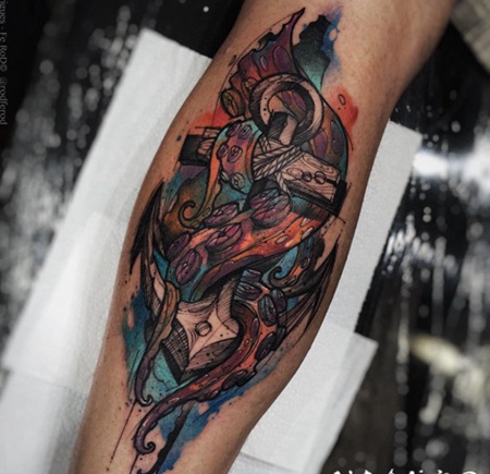 小腿色彩鲜艳的章鱼和船锚纹身图案