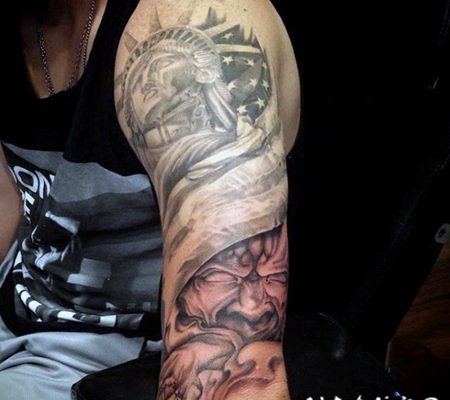 手臂彩色美国自由女神像与国旗和僵尸纹身图案