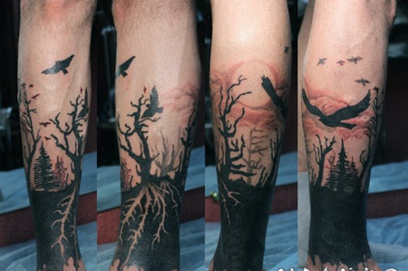 小腿惊人的黑色树和鸟纹身图案