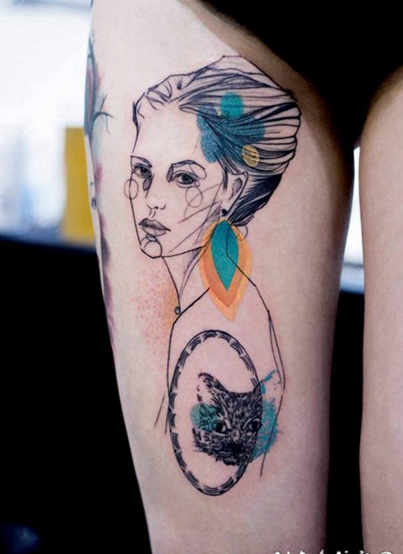 大腿彩色的猫和抽象女人纹身图案