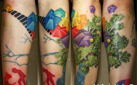 手臂抽象风格的彩色钻石和大树纹身图案