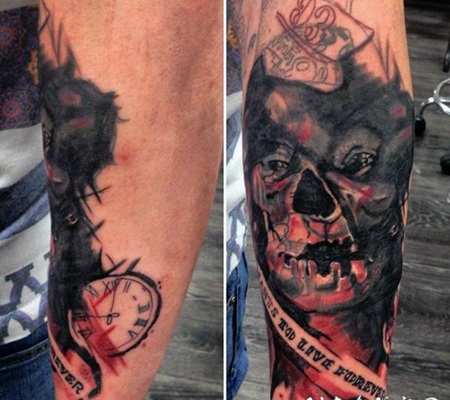 手臂彩色恐怖的怪物和字母纹身图案