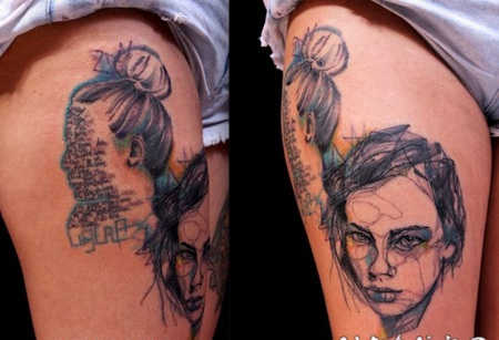 大腿彩色的男人和女人画像与字母纹身图案