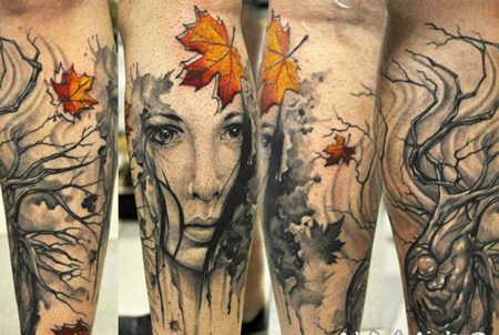 手臂抽象风格的女人与心脏树叶纹身图案