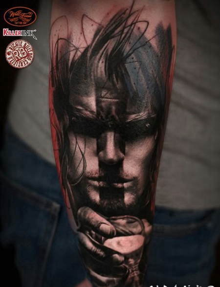 小臂抽象风格的彩色人像纹身图案