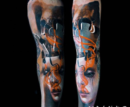 手臂抽象风格的彩色女人面具拼图纹身图案