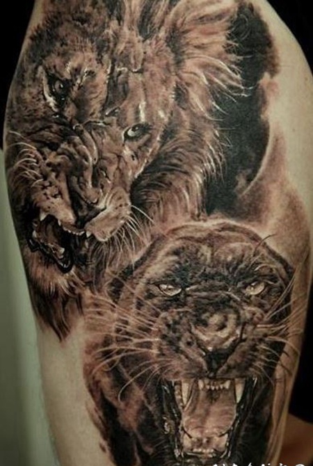 大腿写实的狮子和黑豹纹身图案