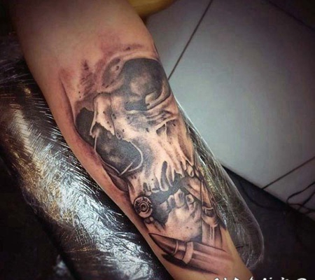 3D写实骷髅与子弹手臂纹身图案