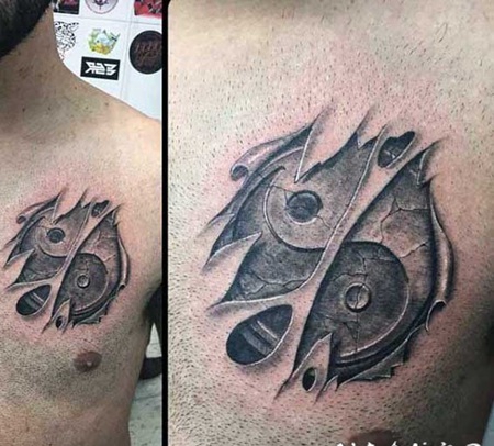 非常逼真的3D标志和撕皮胸部纹身图案