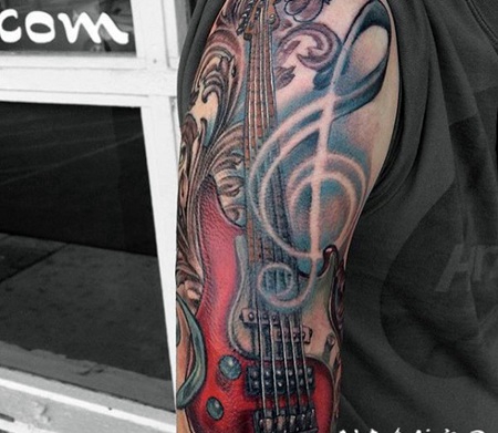 手臂3D彩色的低音吉他纹身图案