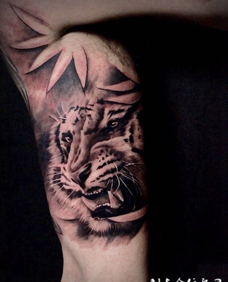 王者的低吼，手臂内侧虎头个性纹身