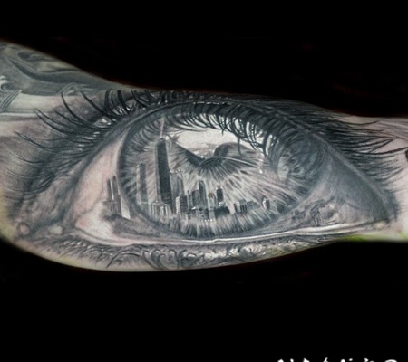 手臂3D风格的人眼睛和城市景观纹身图案缩略频道推荐图