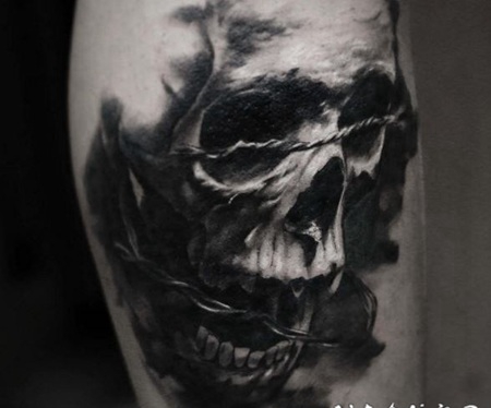 手臂3D风格骷髅和铁丝网纹身图案