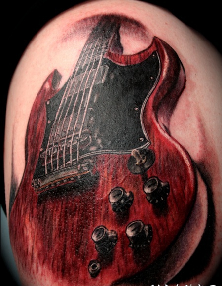 大臂3D风格写实的吉他纹身图案