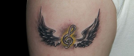 手臂音符翅膀纹身图案