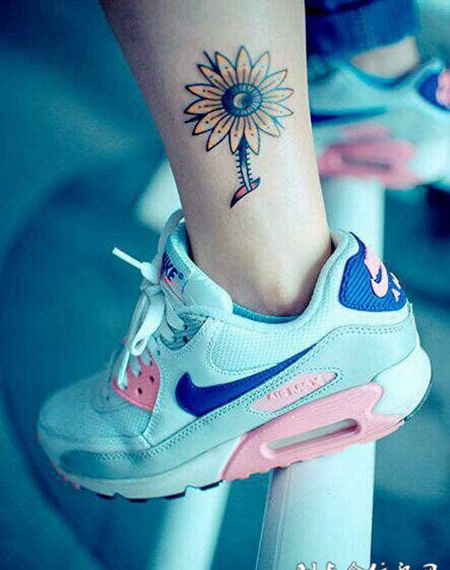 温暖的太阳，腿部向日葵纹身