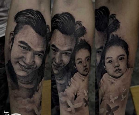 手臂上父亲和孩子肖像纹身图案