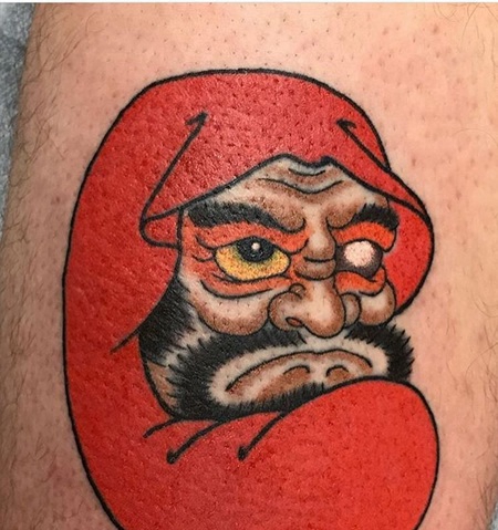 腿部彩色达摩纹身图案