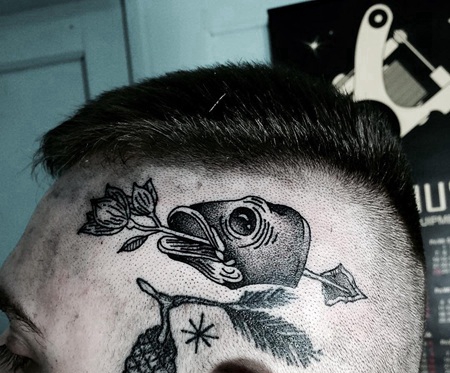 头部鱼头和植物纹身图案