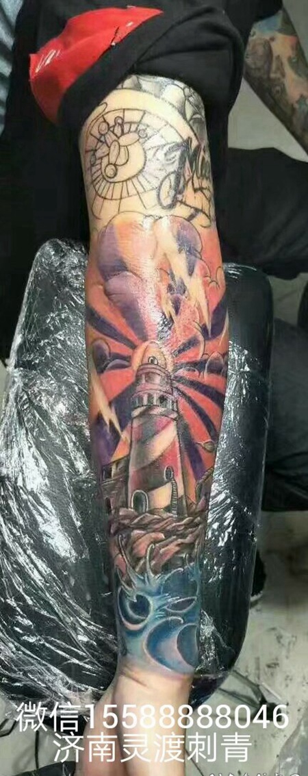 小臂花臂灯塔眼睛纹身