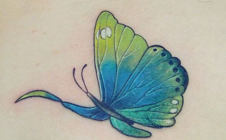 飞舞的绿蝴蝶纹身图案