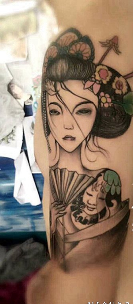 美丽动人的艺妓手臂纹身