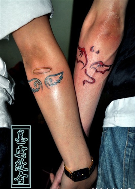 天使恶魔手臂纹身 天使恶魔心手臂纹身图片