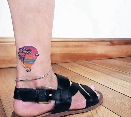 小腿处印着热带植物的创意热气球纹身图片