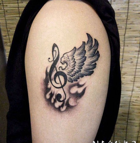 燃烧的音乐之魂，手臂音符图腾翅膀纹身