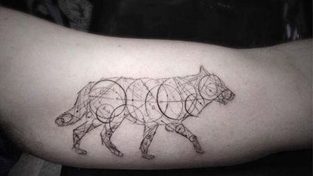 圆形和线条组成的创意黑色狼纹身图案