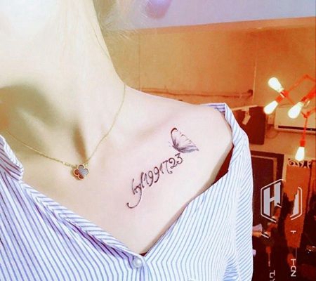 美女锁骨数字与蝴蝶唯美纹身图片