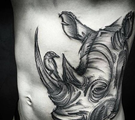 超大型的素描犀牛和鸟纹身图片