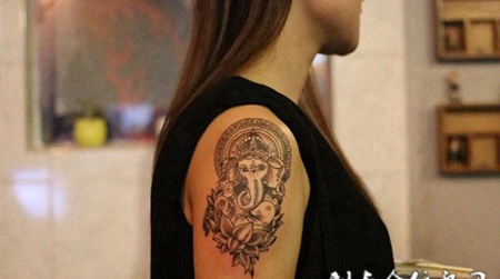 度化世间，手臂象神莲花个性纹身