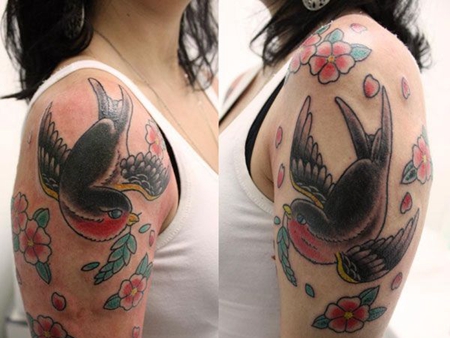 美女手臂燕子樱花纹身图案