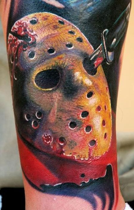 小腿插刀面具纹身图案