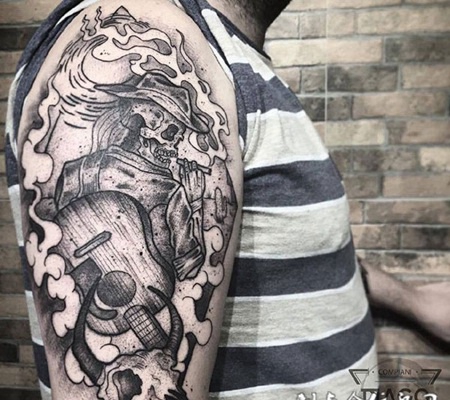 西部之魂，手臂彰显个性的牛仔骷髅纹身图案