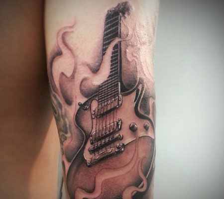 小臂吉他纹身图案