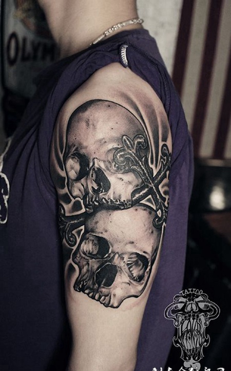 腐朽的信仰，手臂骷髅与十字架纹身