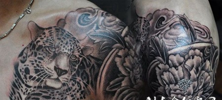 抢眼的传统豹牡丹纹身