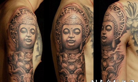 胳膊上闭眼的佛祖纹身