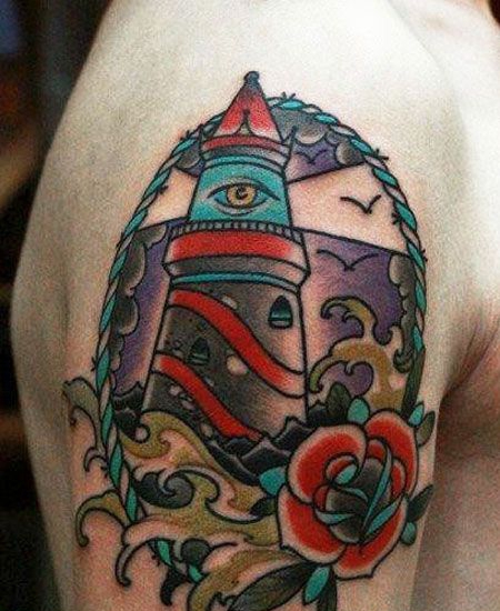 肩部花环内灯塔纹身图案