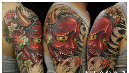 胳膊上的般若花纹身