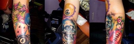 手臂个性的骷髅头麦克风纹身图案