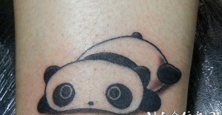 忧伤中的小熊猫纹身