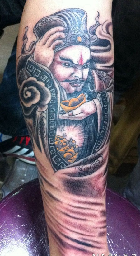 小腿上的财神爷纹身