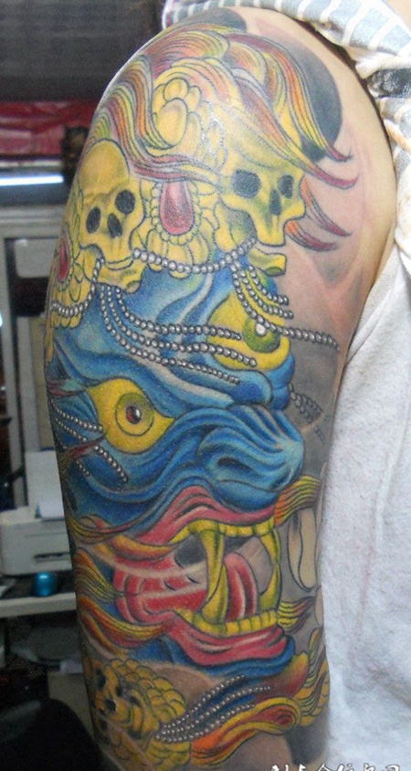 胳膊上的传统大黑天纹身