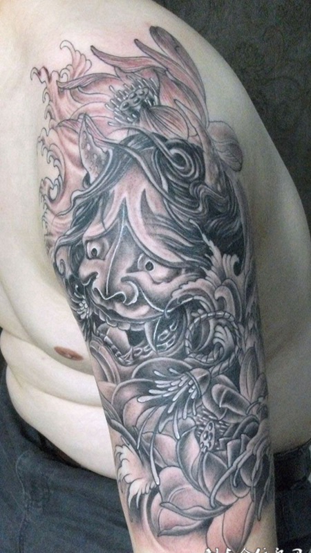 胳膊上的般若荷花纹身