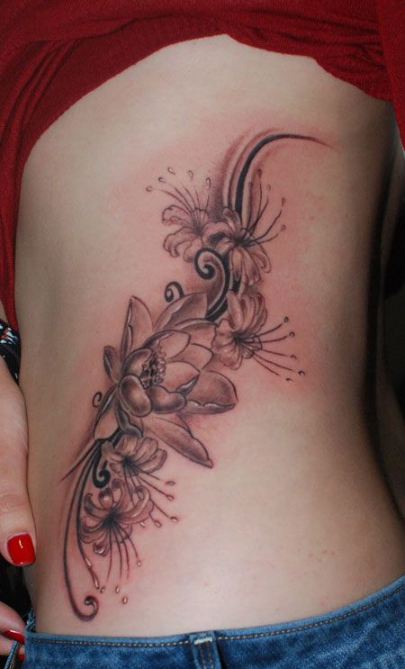 侧腰荷花彼岸花纹身图案