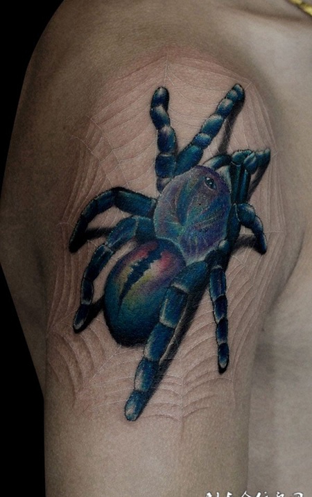 胳膊上的蜘蛛纹身